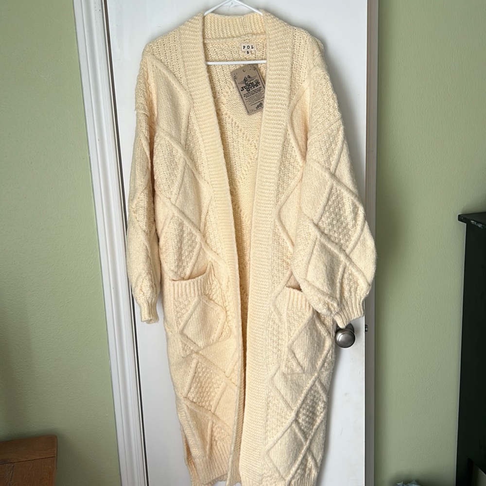 Perfect for a Christmas gift!! Brand new with tags. Size small.